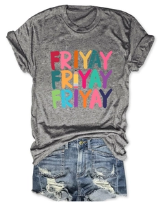 Flat lay of gray T-shirt with Friyay art print and distressed denim shorts