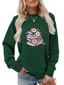 Detail of crewneck sweatshirt with vintage book illustration and floral butterfly print