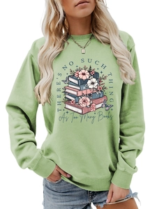 Detail view of the floral book stack graphic and artistic text on a green sweatshirt