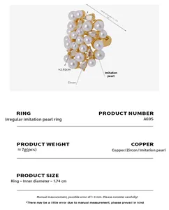 Detail showing irregular gold copper ring with pearls and zircons, size 1.74cm diameter