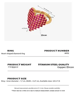 Detailed view of copper ring featuring heart-shaped pink cubic zirconia in pavé setting