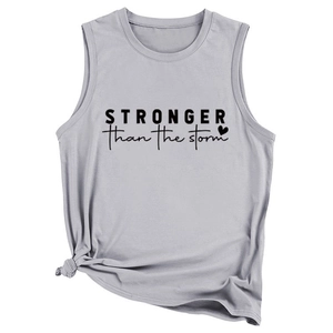 Detail of the knotted hem and Stronger Than The Storm print on grey tank top