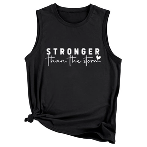 Detail of black tank top with 'STRONGER than the storm' print and side-knot styling