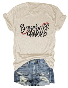 Detail of beige baseball Grammy t-shirt paired with distressed denim shorts on white background