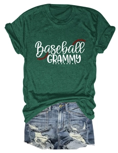 Flat lay of dark green Baseball GRAMMY t-shirt with ripped denim shorts set