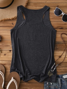 Close-up of dark grey racerback tank top on wooden background with summer accessories