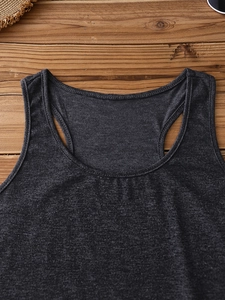 Close-up of ribbed texture and stitching on dark grey racerback tank top for women