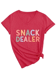 Detail of red V-neck T-shirt with Snack Dealer pop art print and stylish side-knot hemline