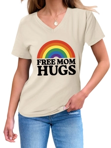 Close-up of beige V-neck T-shirt with rainbow print and Free Mom Hugs text