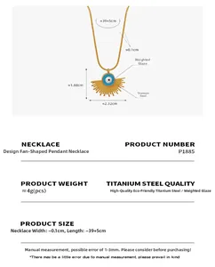Detail view of gold fan-shaped evil eye pendant with exact size measurements and dimensions