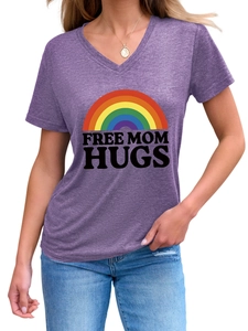 Detailed close-up of Free Mom Hugs rainbow print on heather purple v-neck shirt