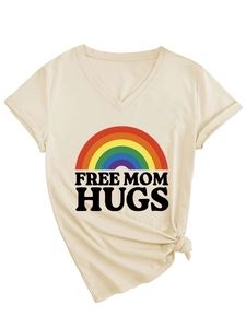 Detail view of beige V-neck T-shirt featuring rainbow print and front hem knot design