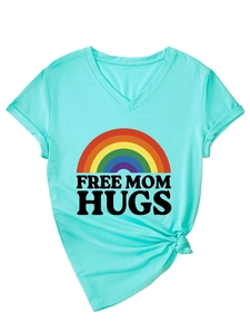 Detail of Free Mom Hugs slogan and rainbow print on light blue V-neck cotton T-shirt