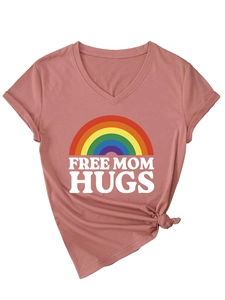 Detail of the V-neck t-shirt with rainbow print and a trendy front knot at the hemline