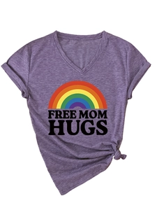 Close-up of Heather Purple V-neck T-shirt with rainbow Free Mom Hugs print and tied hem