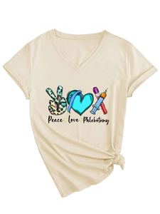 Detail of V-neck T-shirt showing Peace Love Phlebotomy print and stylish knotted hem