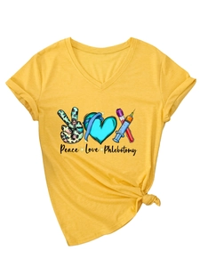 Close-up of Peace Love Phlebotomy medical print on bright yellow V-neck short sleeve t-shirt