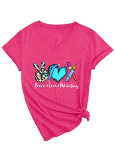 Close-up of Peace Love Phlebotomy graphic on rose red V-neck shirt with leopard and heart