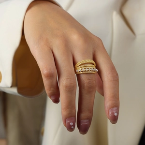 Elegant multi-layer gold ring with white pearls and champagne cubic zirconia for women