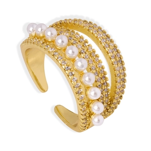 Gold layered Virgin Mary ring with pearls and zircon stones on a white background