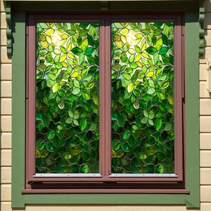 Static cling window film with green leaf pattern and colorful stained glass effect