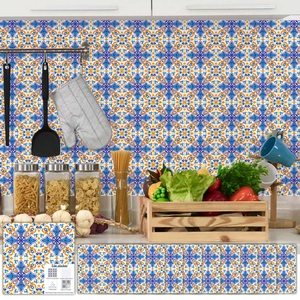 Detail of 10-piece waterproof blue and orange mandala tile stickers for kitchen backsplashes