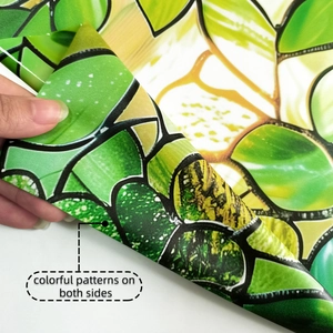 Detail showing colorful botanical leaf patterns printed on both sides of window film
