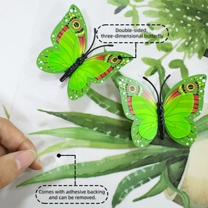 Detail showing 3D double-layer green butterfly wall stickers with adhesive backing