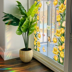 Rainbow window film with yellow flowers and butterflies creating colorful sun catchers