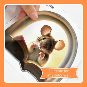 Detail showing hand peeling 3D mouse reading wall sticker from base paper
