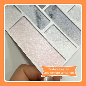 Detail of 3D marble texture mosaic wall tile with pink and white embossed stone patterns