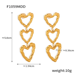 Detailed view showing triple irregular hollow heart earrings with dimensions and weight