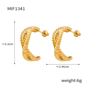 Detailed view of gold C-shaped spiral hoop earrings with dimensions and woven texture