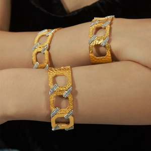 Men's gold hammered C-shaped cuff bracelet with cubic zirconia paving in hip hop style