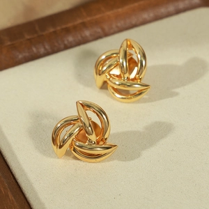 French style 18k gold plated hollow crescent windmill earrings with twisted metal design