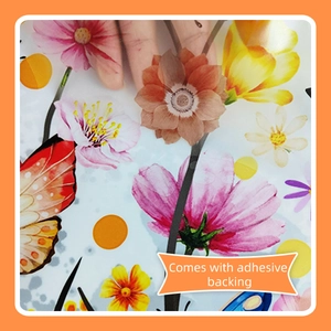 Detail of self-adhesive wall sticker featuring pink dahlia, yellow flowers, and butterflies