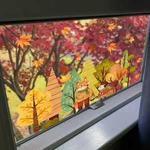 Autumn window clings set featuring cartoon foxes, hedgehogs, and maple leaves decorations