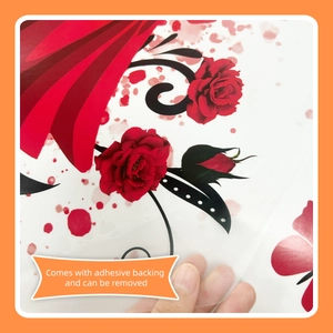Detail of self-adhesive wall sticker featuring red roses and easy peel-off backing