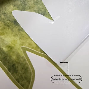 Détail de sticker dinosaure aquarelle montrant la texture fine et l'imprimé de feuille