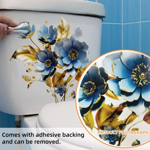 Blue and gold floral toilet seat cover sticker with self-adhesive backing on white tank