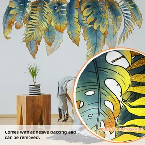 Stickers muraux tropicaux feuilles de monstera bleu et or pour décor de salon