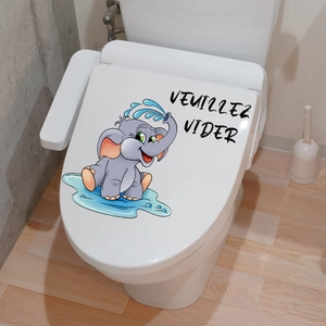 Detail showing cartoon elephant wall sticker with VEUILLEZ VIDER text on toilet lid