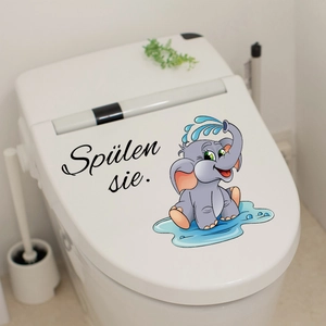 Detail of cute elephant toilet sticker with Spülen sie text for bathroom decor