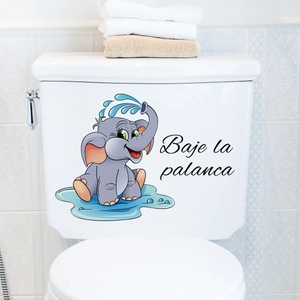Detail of cute elephant toilet sticker with Spanish Baje la palanca reminder text