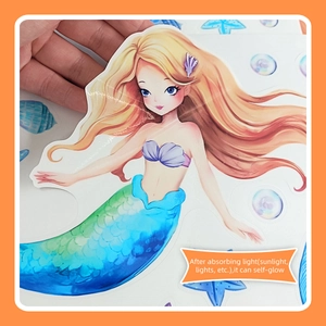 Glow-in-the-dark mermaid wall sticker with blue-green gradient tail and shell top for kids