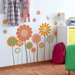 Detail of floral wall stickers with colorful large flowers and butterflies in a nursery