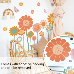 Detail of bohemian flower wall decals in a warm nursery with removable adhesive