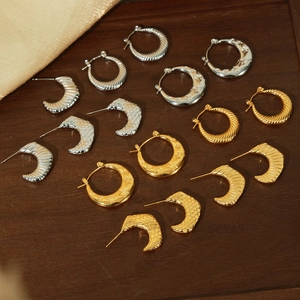 Set of geometric textured titanium steel earrings with star motifs and moon shapes