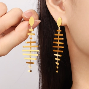 Elegant gold fishbone tassel earrings in titanium steel with geometric long drop design