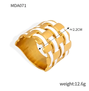 Detail of woven 18k gold plated ring with white enamel, 2.2cm inner diameter